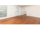 Spacious room with hardwood floors and natural light from large windows at 295 Glen Lake Dr, Atlanta, GA 30327