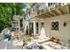 Backyard with wooden deck and outdoor seating at 411 Woodstone West Dr, Marietta, GA 30068