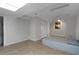Finished basement with a drop ceiling and carpet, perfect for use as an extra bedroom at 411 Woodstone West Dr, Marietta, GA 30068