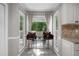 Charming breakfast nook with seating and a lovely view of the outdoors at 411 Woodstone West Dr, Marietta, GA 30068