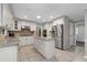 Bright kitchen with white cabinets, stainless steel appliances, and a center island at 411 Woodstone West Dr, Marietta, GA 30068