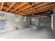 Unfinished basement with exposed ceiling, and block walls provides an open space for customization at 1791 Melrose Sw Dr, Atlanta, GA 30310