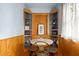 Cozy breakfast nook with built-in shelves, light blue paint, and ample natural light at 1791 Melrose Sw Dr, Atlanta, GA 30310