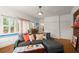 Spacious living room with hardwood floors, white trim and comfortable seating at 1791 Melrose Sw Dr, Atlanta, GA 30310