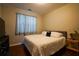 Cozy bedroom with hardwood floors, natural light and TV at 120 Clifford Ct, Canton, GA 30115