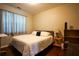 Bedroom features hardwood floors, natural light, and simple decor at 120 Clifford Ct, Canton, GA 30115
