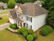 Beautiful two-story home featuring lush landscaping and a well-maintained lawn at 120 Clifford Ct, Canton, GA 30115