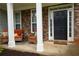 Cozy front porch with rocking chairs, creating a welcoming outdoor seating area at 120 Clifford Ct, Canton, GA 30115