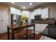 Beautiful kitchen with stainless steel appliances, white cabinets, and a large wooden kitchen island at 120 Clifford Ct, Canton, GA 30115