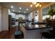 Bright kitchen featuring stainless appliances, granite countertops, and a gas cooktop island at 120 Clifford Ct, Canton, GA 30115