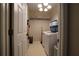 Laundry room with washer, dryer, utility sink, storage and tiled flooring at 120 Clifford Ct, Canton, GA 30115