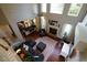 Aerial view showcasing living room with fireplace, tall ceilings, and open floor plan at 120 Clifford Ct, Canton, GA 30115