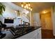 Open floor plan showing the kitchen island, and large living room with a staircase to the second floor at 120 Clifford Ct, Canton, GA 30115