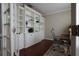Bright home office with custom built-in shelving, hardwood floors, and natural light at 120 Clifford Ct, Canton, GA 30115
