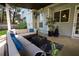 Covered patio featuring outdoor seating, a ceiling fan, a fountain, and an overhead heater at 120 Clifford Ct, Canton, GA 30115