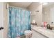 Charming bathroom featuring a unicorn shower curtain and a granite countertop sink at 4015 Soaring Dr, Douglasville, GA 30135