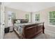 Bedroom with neutral carpet, natural light, and closet space at 4015 Soaring Dr, Douglasville, GA 30135