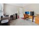 Bedroom showcasing a built-in desk, plush carpet and lots of natural light at 4015 Soaring Dr, Douglasville, GA 30135