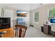 Bright bedroom with neutral walls and carpet, complete with a built-in desk at 4015 Soaring Dr, Douglasville, GA 30135
