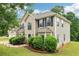Exterior shot of a home with a two-car garage and manicured landscaping at 4015 Soaring Dr, Douglasville, GA 30135