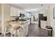 Kitchen with white cabinets, countertops, and bar seating at 4015 Soaring Dr, Douglasville, GA 30135