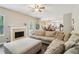 Open-concept living room with fireplace and seamless flow into the dining area at 4015 Soaring Dr, Douglasville, GA 30135