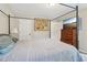 Comfortable main bedroom with a four-poster bed and ample natural light at 4015 Soaring Dr, Douglasville, GA 30135