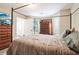 Comfortable main bedroom with a four-poster bed and ample natural light at 4015 Soaring Dr, Douglasville, GA 30135