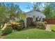 Landscaped backyard showcasing blooming flowers and a well-maintained lawn at 3005 Howell Mill Rd, Atlanta, GA 30327