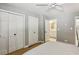 Comfortable bedroom with multiple closets and ensuite bathroom at 3005 Howell Mill Rd, Atlanta, GA 30327
