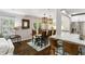 Cozy dining area featuring an adjacent breakfast bar and views to the kitchen for easy access at 3005 Howell Mill Rd, Atlanta, GA 30327