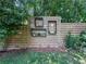 Unique backyard fence features wooden cutouts as outdoor decorations at 3075 Nuthatch Nw Ct, Kennesaw, GA 30144