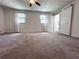 Bright bedroom with ample natural light and a ceiling fan at 3075 Nuthatch Nw Ct, Kennesaw, GA 30144