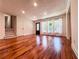 Expansive living room with hardwood floors and staircase at 3075 Nuthatch Nw Ct, Kennesaw, GA 30144