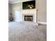 Cozy main bedroom with gray walls, carpeted floor and featuring a fireplace at 3075 Nuthatch Nw Ct, Kennesaw, GA 30144