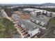 Aerial view of newly constructed townhomes with private balconies and modern design in a well-planned community at 1907 Deco Dr, Kennesaw, GA 30144
