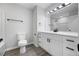 Bright bathroom featuring updated vanity with new fixtures and shower-tub combination at 2246 Hightrail Ct, Lithonia, GA 30058
