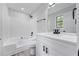 Modern bathroom featuring updated vanity, new fixtures, and shower-tub combination at 2246 Hightrail Ct, Lithonia, GA 30058