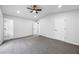 Spacious bedroom with new carpet and ceiling fan offers comfort and style at 2246 Hightrail Ct, Lithonia, GA 30058