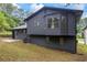 Two-story home featuring a large window and siding at 2246 Hightrail Ct, Lithonia, GA 30058