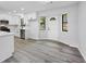 Modern kitchen with stainless steel appliances, white cabinets, and a bay window at 2246 Hightrail Ct, Lithonia, GA 30058
