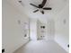 Empty bedroom featuring built-in cabinets, neutral carpet, and white walls at 510 Belada Blvd, Atlanta, GA 30342