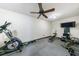 Home gym with rubber flooring, ceiling fan, and workout equipment at 510 Belada Blvd, Atlanta, GA 30342