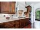 Gourmet kitchen featuring custom cabinets, granite countertops, and high-end stainless steel appliances at 510 Belada Blvd, Atlanta, GA 30342