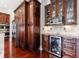 Stylish kitchen features dark wood cabinets, stainless steel appliances, and a wine cooler at 510 Belada Blvd, Atlanta, GA 30342