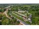 Aerial view of townhome community with lush green trees and landscaping at 732 Province Se Pl, Atlanta, GA 30312