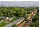 Community aerial view, tree lined streets with Atlanta skyline in the background at 732 Province Se Pl, Atlanta, GA 30312