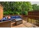Private wooden back deck furnished with comfortable seating, offering an ideal spot for relaxing or entertaining outdoors at 732 Province Se Pl, Atlanta, GA 30312