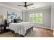 Bedroom with a large window for natural light and hardwood flooring at 732 Province Se Pl, Atlanta, GA 30312