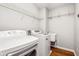Laundry room with modern appliances, and utility sink at 732 Province Se Pl, Atlanta, GA 30312